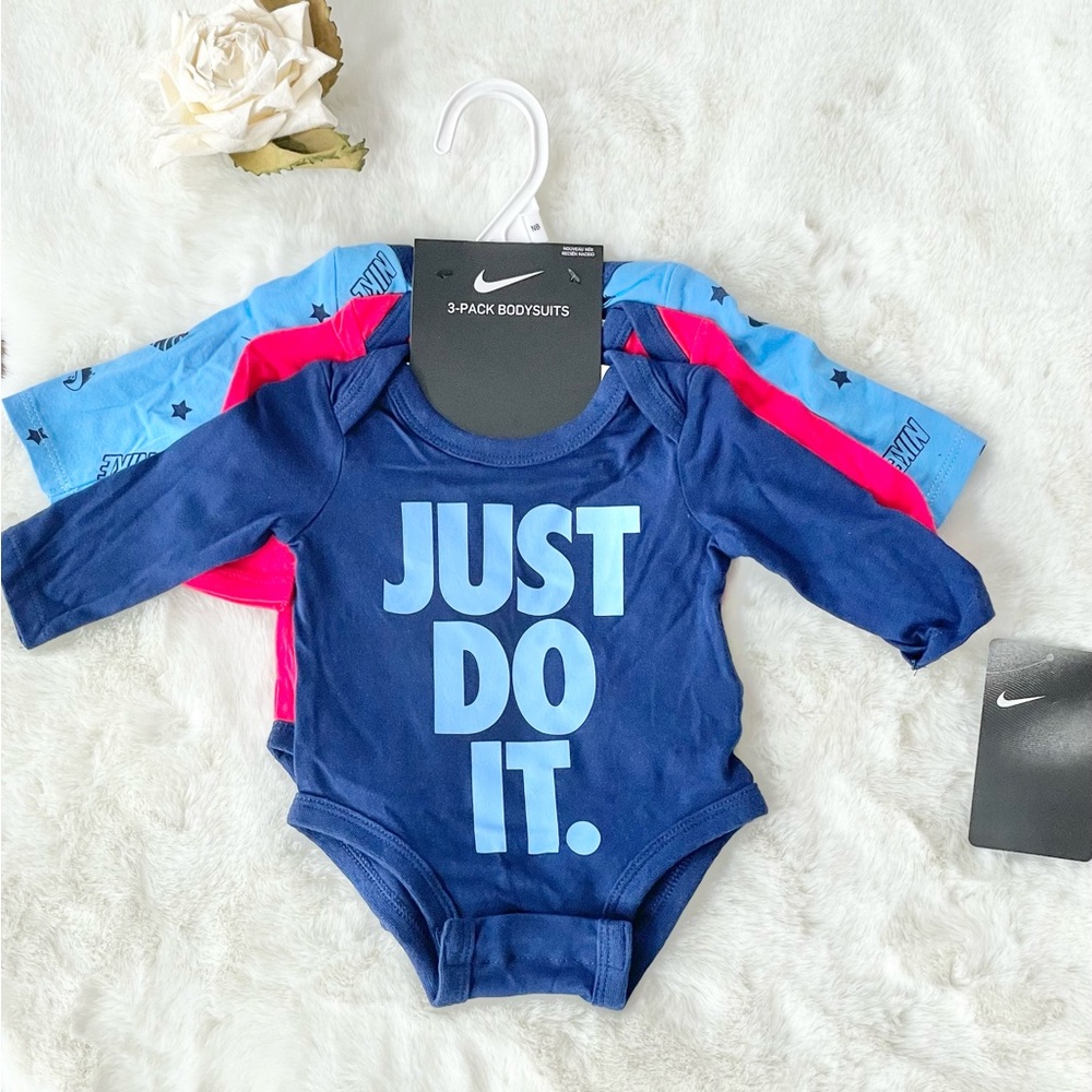 NWT NIKE 3PK LOGO BODYSUITS (onesies) w/logo and “JUST DO IT & “I RUN THE SHOW”